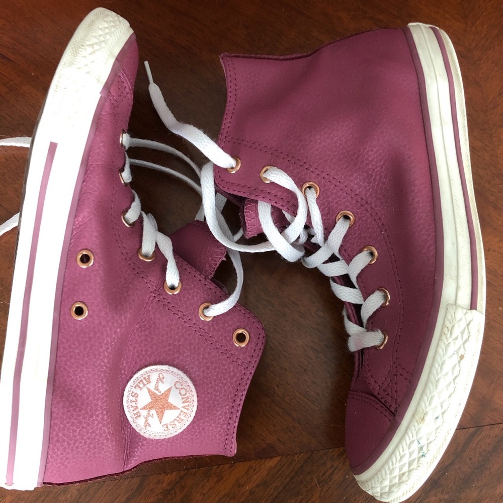 Purple leather Converse high tops